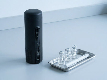 Svalto Cooler Pro beside a stainless tray of insulin vials and a pen