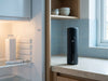 Open fridge with medication carton and pens next to the Svalto Cooler Pro