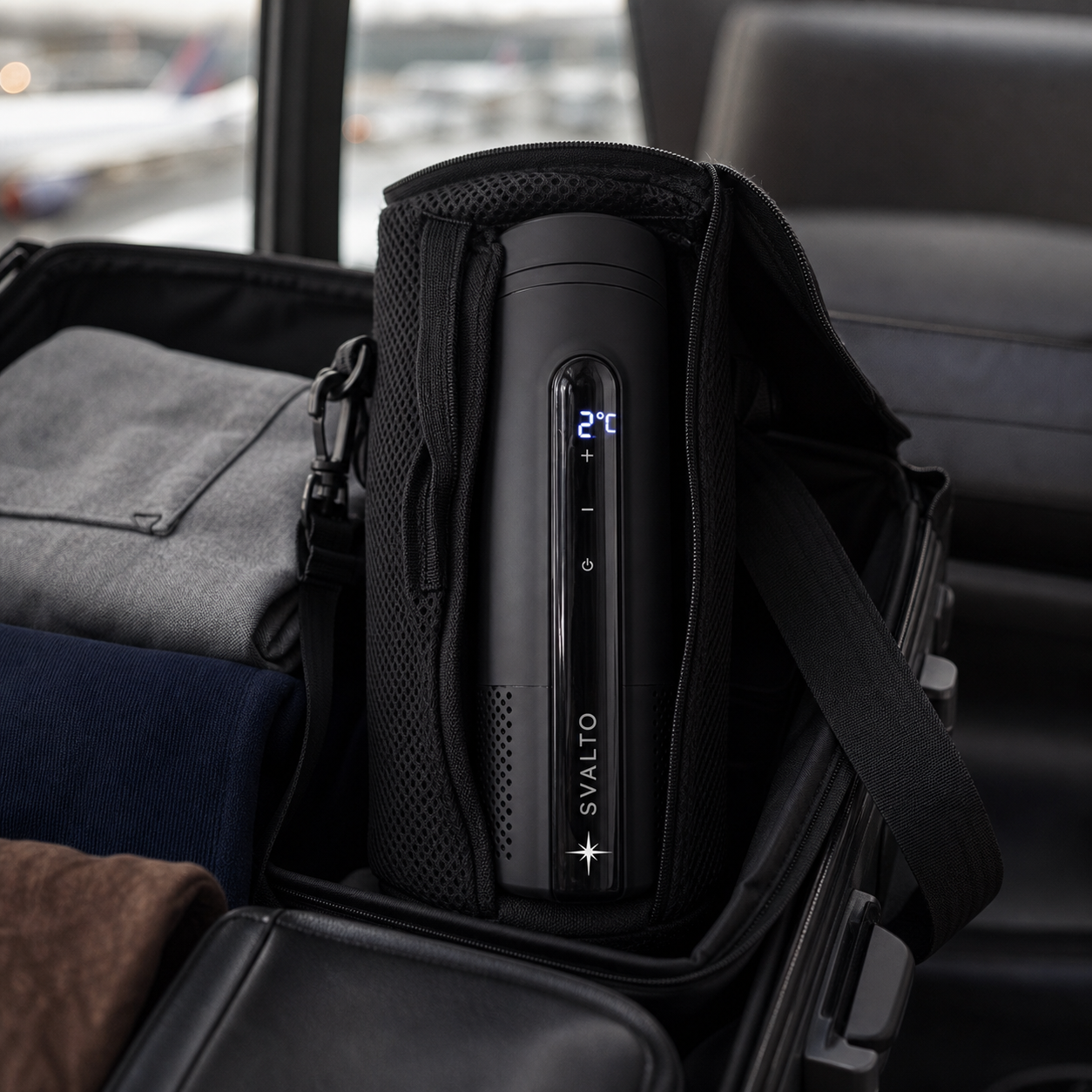 Onyx Black Svalto Cooler Pro — in the travel sleeve on a carry-on