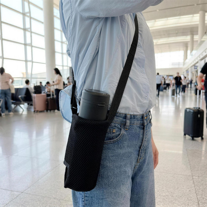 Svalto Travel Bag worn crossbody at the hip with the Cooler Pro inside