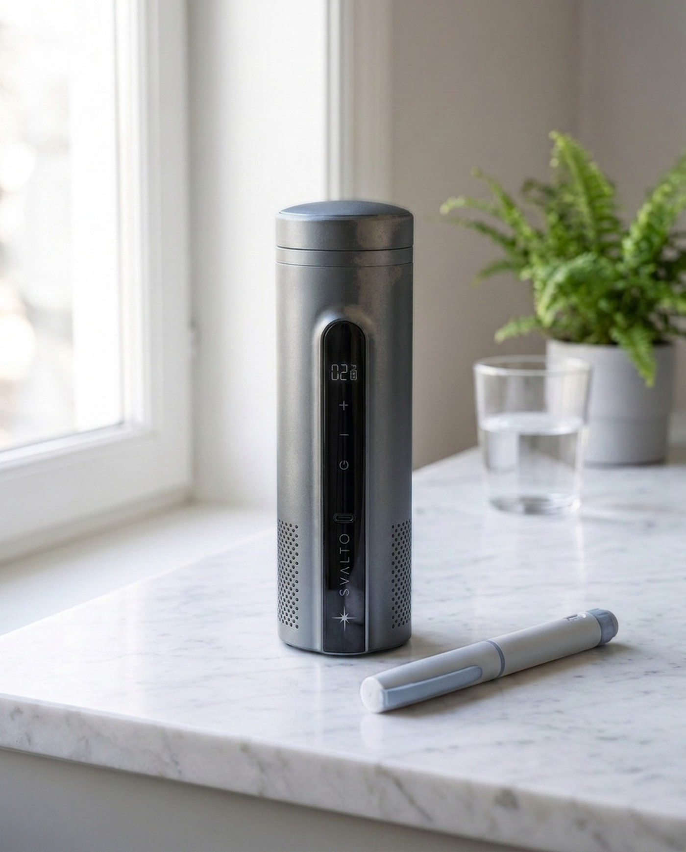 Titanium Svalto Cooler Pro — on a kitchen counter beside an insulin pen