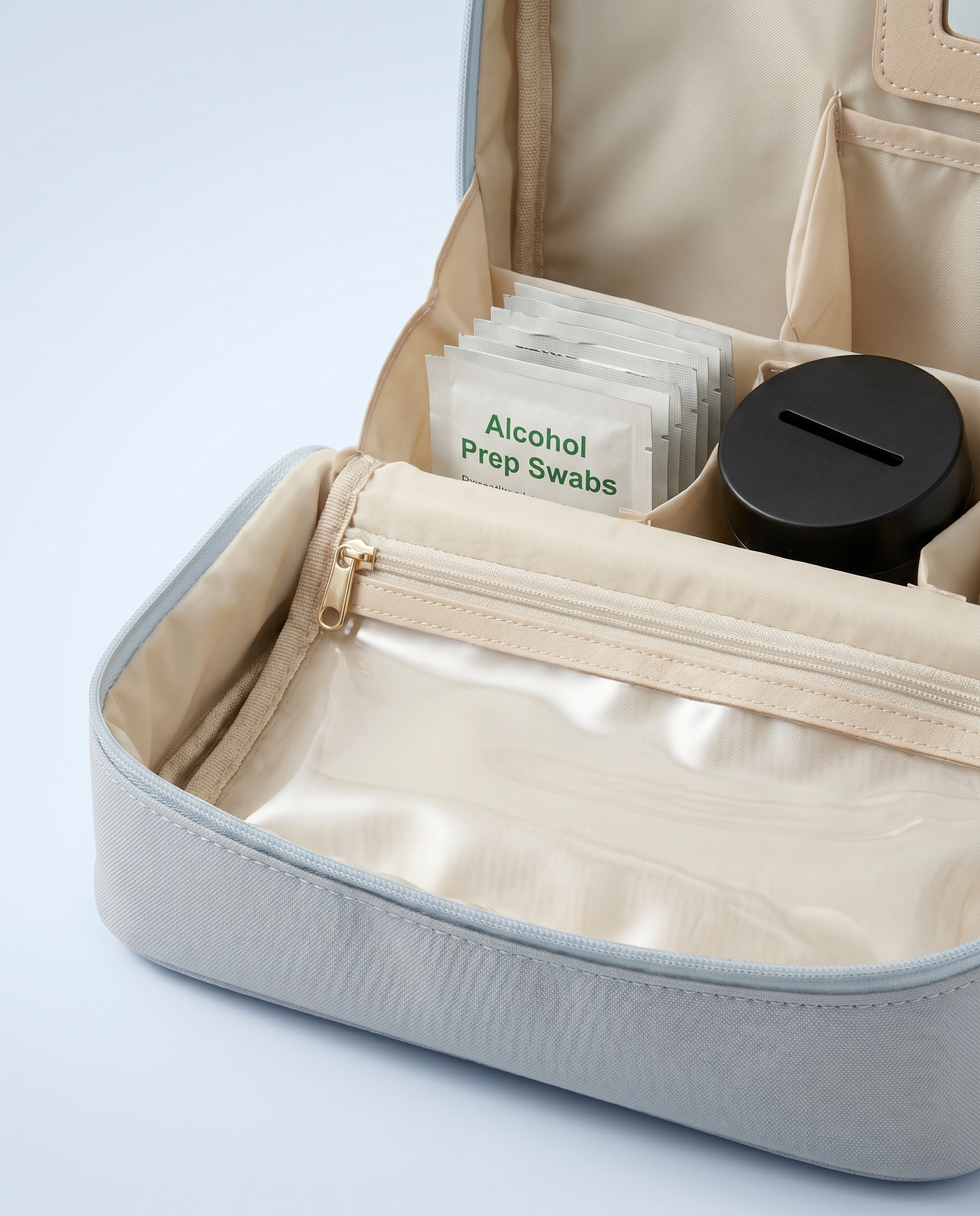 Sealed prep swabs and travel sharps tin in their compartments