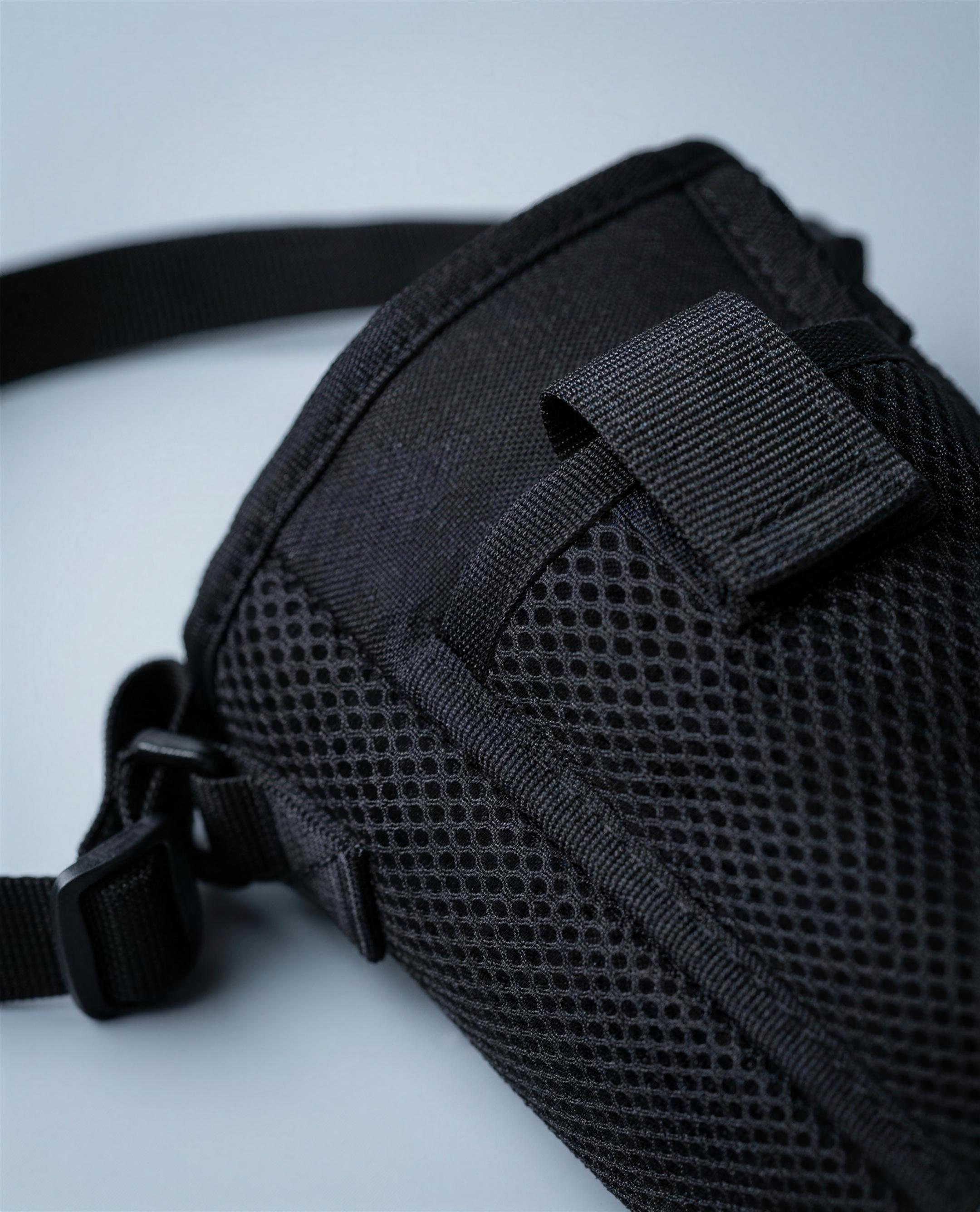 Air-mesh weave and hook-and-loop flap detail