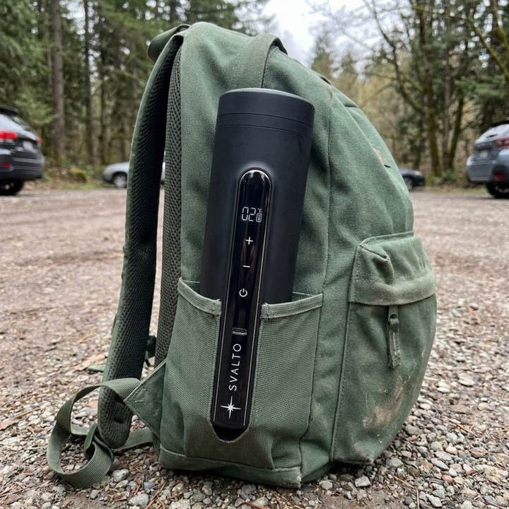 Svalto Cooler Pro strapped to a backpack at a trailhead, customer photo