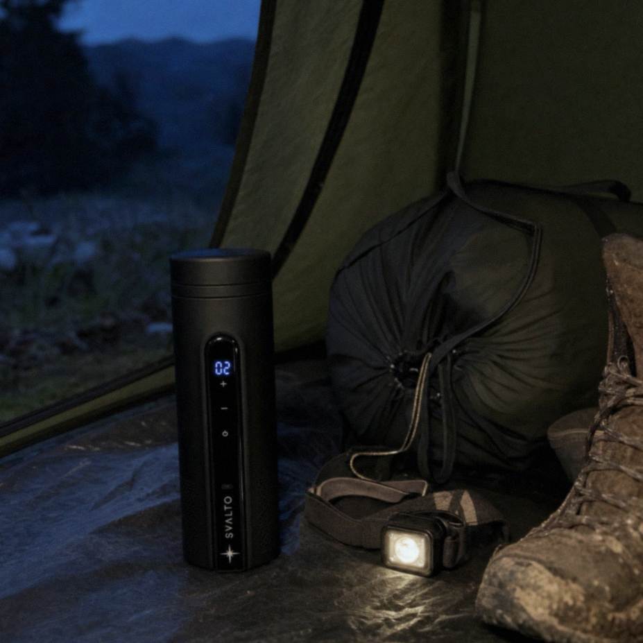 Svalto Cooler Pro in a tent doorway at dusk beside a sleeping bag and boots, customer photo