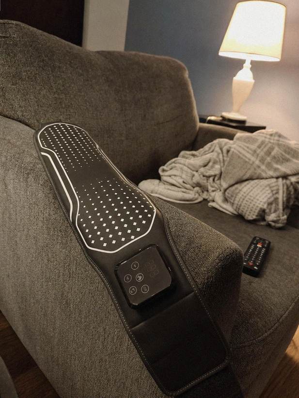 Customer photo: Transit Belt on the sofa armrest